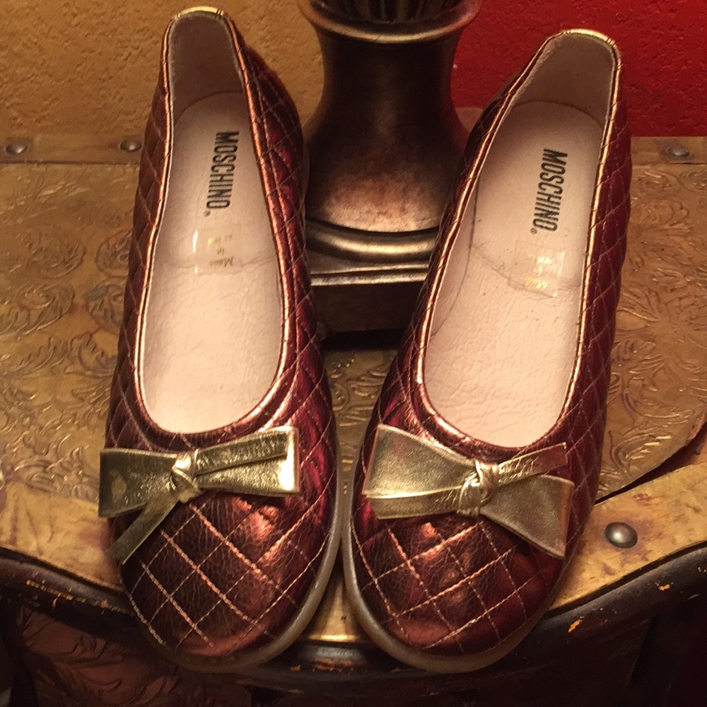 Moschino bronze quilted leatherflats with gold bow
